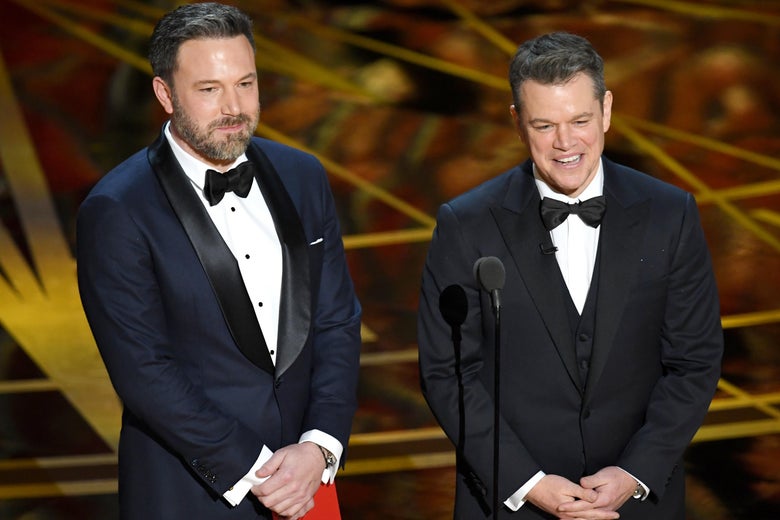 Ben Affleck and Matt Damon speak onstage during the 89th Annual Academy Awards.